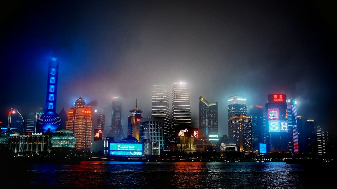 A city skyline is lit up at night