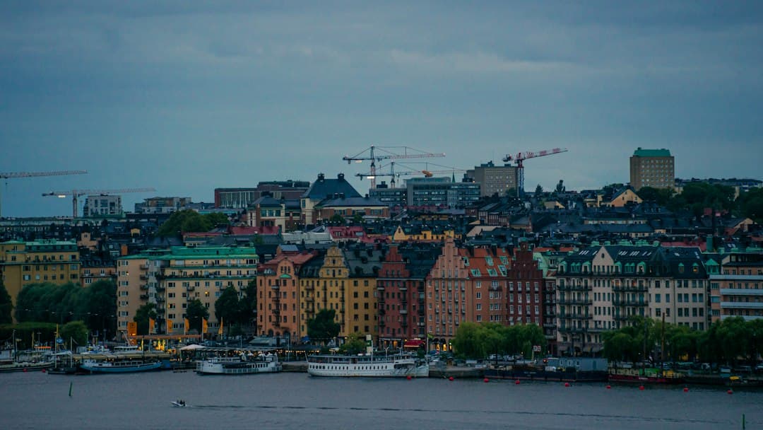 A large body of water with a city in the background
