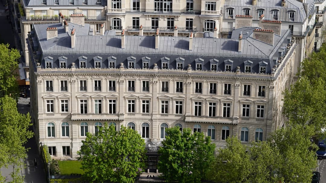 An aerial view of a large building with many windows