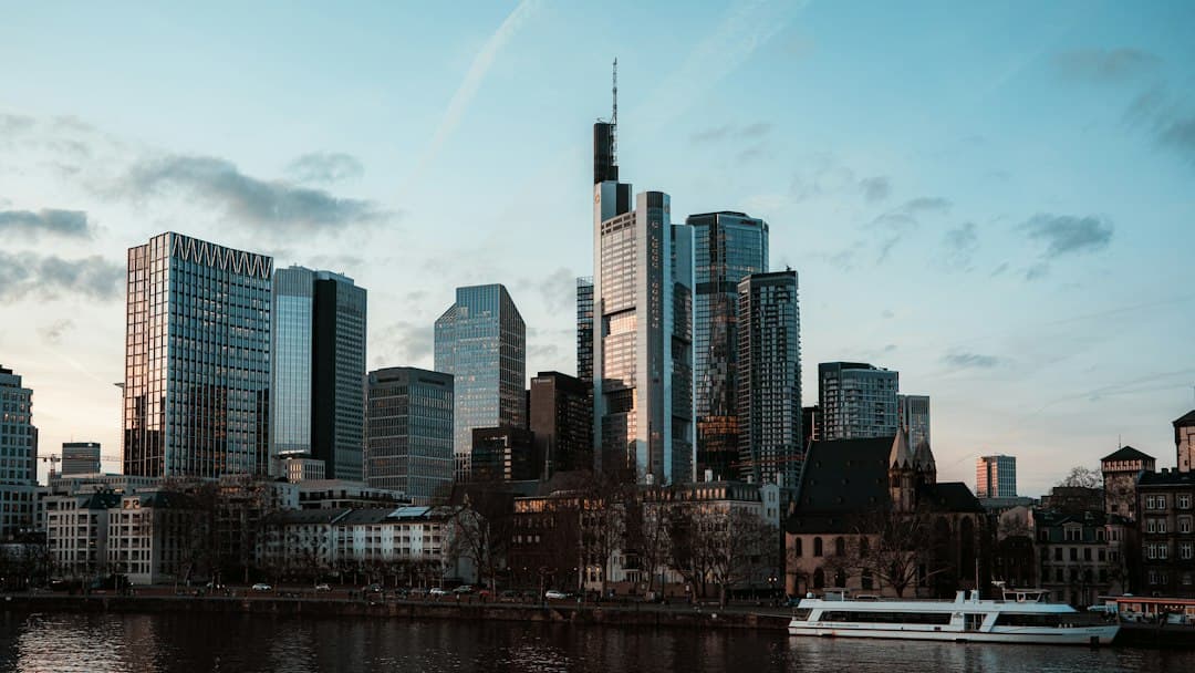 Modern skyscrapers and traditional buildings by the water