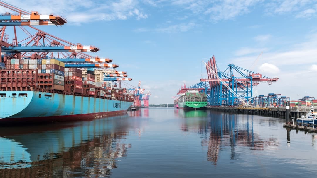 Container ships and cranes at a busy port.