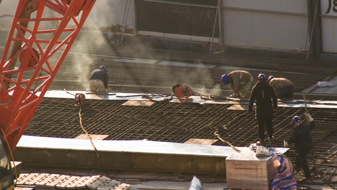 a group of men working on a construction site